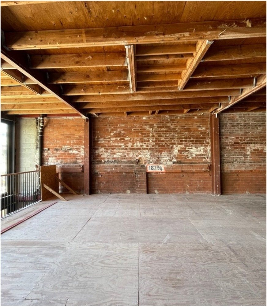 Exposed brick interior of 1222 Third Street Promenade