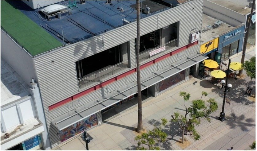 Exterior of the 1231–1233 building showing the second story